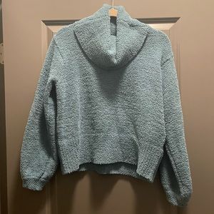 Fuzzy teal sweater